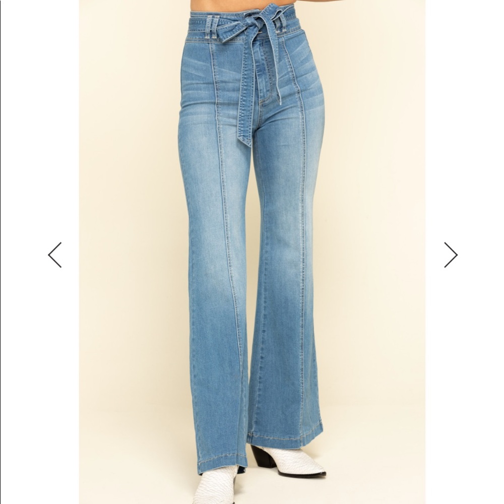 Flare jeans with bow belt tie